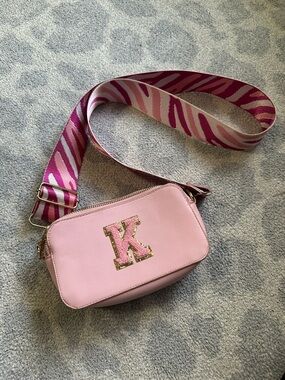 Walmart Pink Kids purse with pink zebra strap and K monogram patch